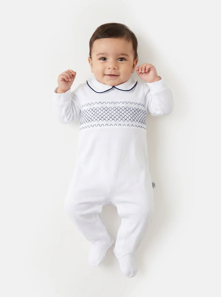 White All-in-One with Navy Smocking